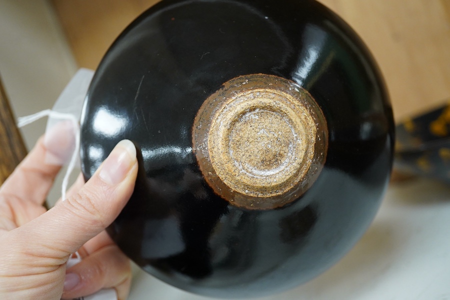 Four Chinese ‘hares fur’ pottery bowls, largest 16cm diameter. Condition - good